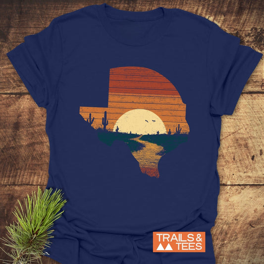 Texas Sunset T-Shirt features a distressed Texas graphic with a desert sunset scene on soft, lightweight cotton, perfect for outdoor adventures.
