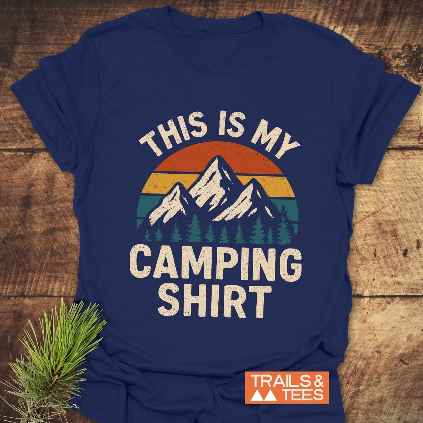This Is My Camping T-Shirt with retro sun, mountain, and pine graphic; soft ring-spun cotton, pre-shrunk, durable print, ideal for outdoor adventures.