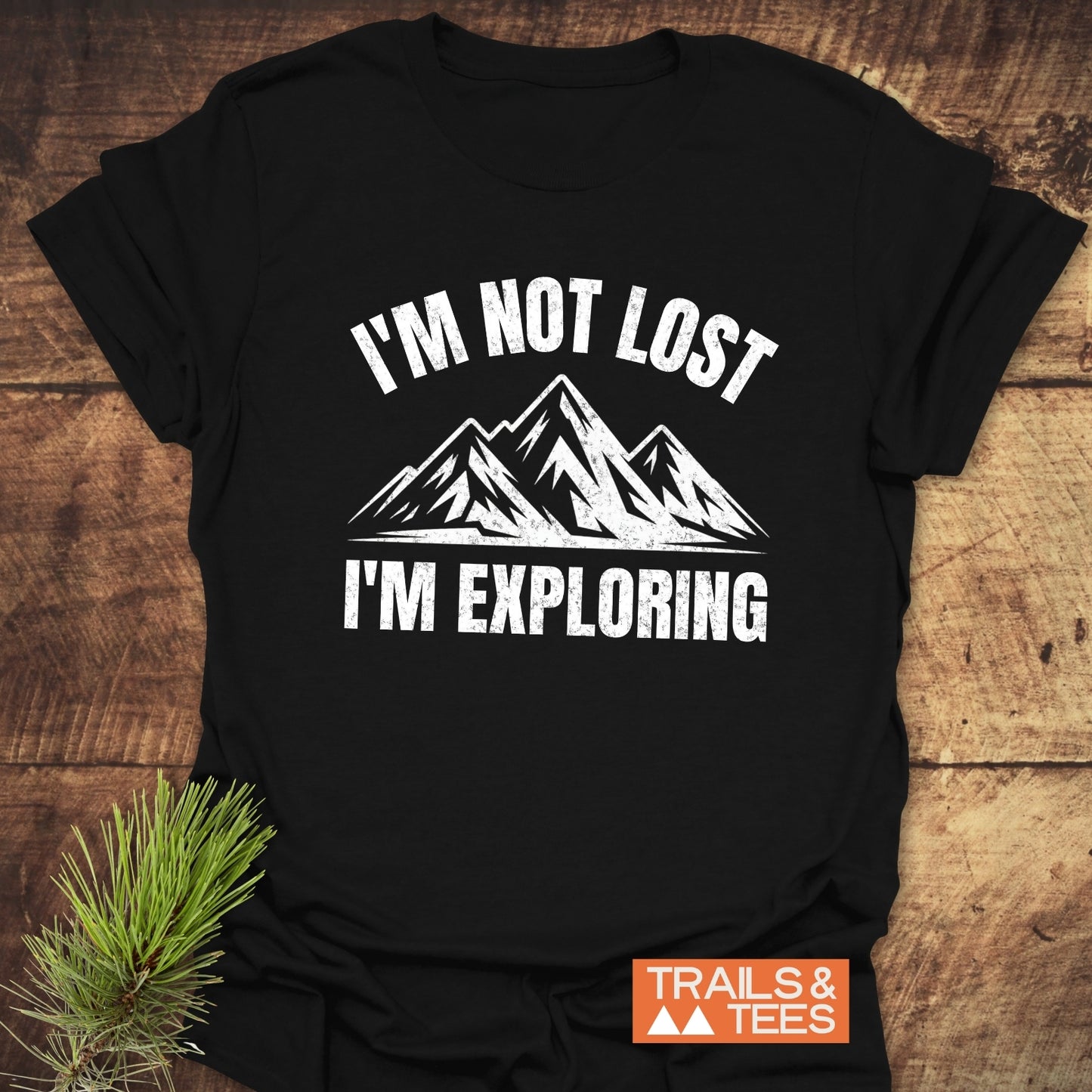 I'm Not Lost I'm Exploring T-Shirt with a mountain graphic, crafted from soft cotton for comfort. Features durable prints, pre-shrunk fit, and eco-friendly production.