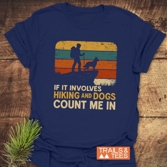 Navy blue Hiking And Dogs T-Shirt featuring a vintage hiker and dog graphic with the slogan, crafted for comfort with durable, pre-shrunk cotton.