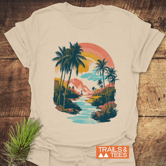 Along The River T-Shirt: Light-beige tee featuring a retro tropical scene with palm trees and sunset, crafted from soft cotton for outdoor adventures.
