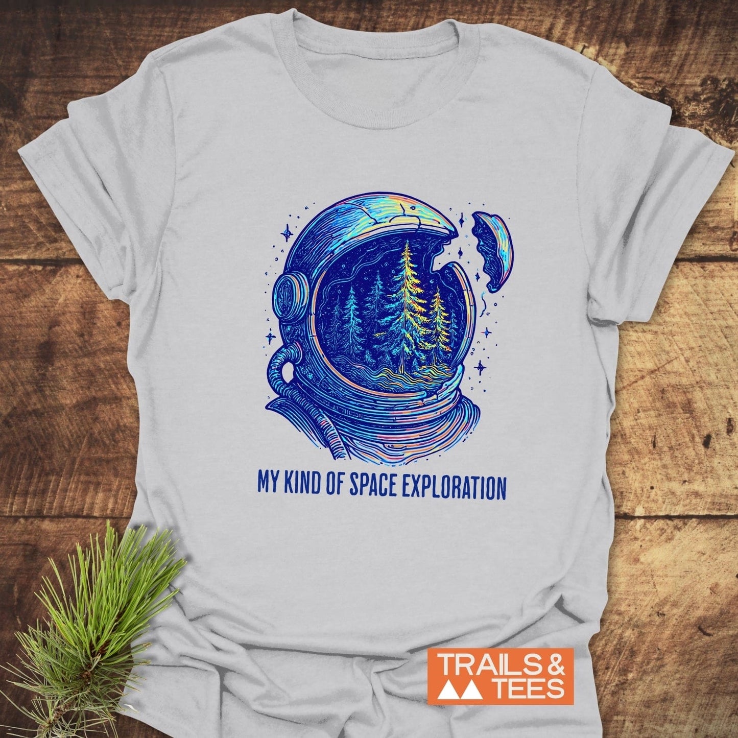 My Kind Of Space Exploration T-Shirt with astronaut helmet graphic revealing a pine forest, slogan below, on soft, lightweight cotton for outdoor adventures.