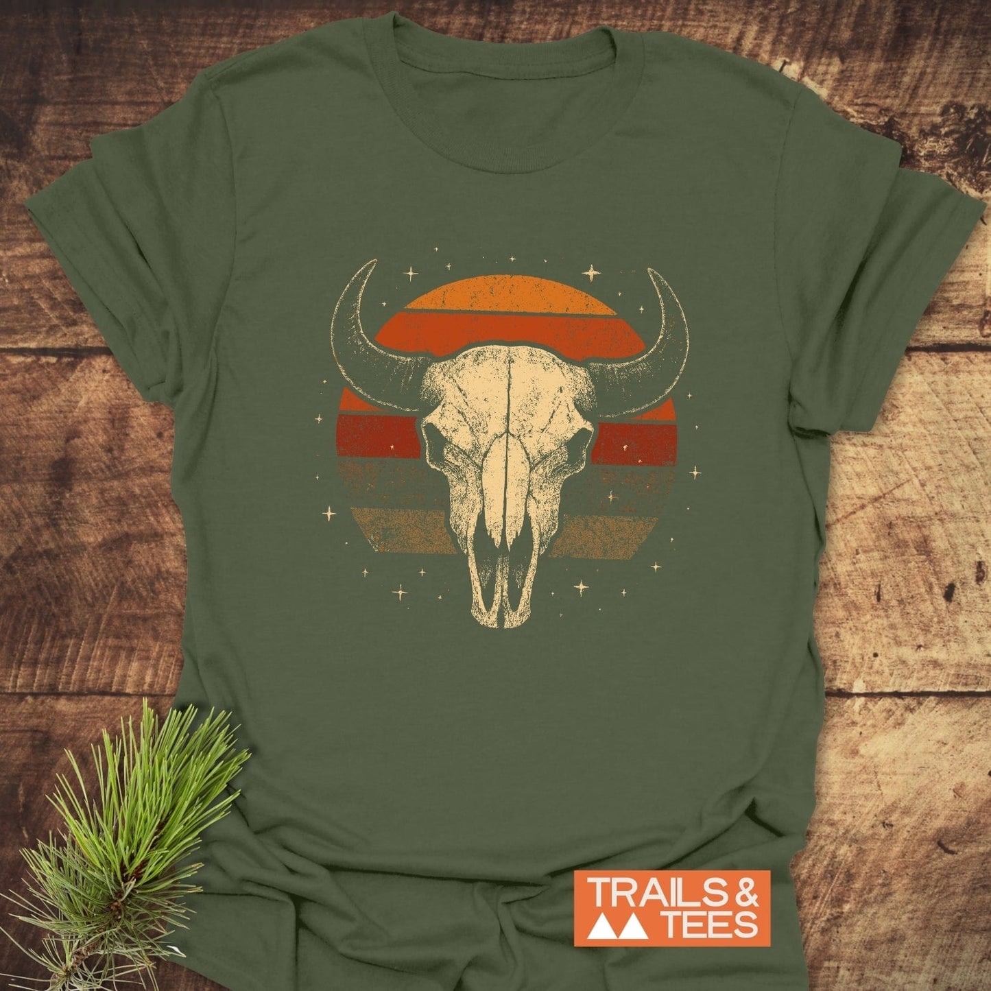 Retro Buffalo Skull T-Shirt featuring a bison skull graphic on olive-green cotton, designed for comfort and durability. Ideal for outdoor enthusiasts and everyday wear.