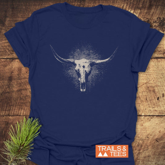Buffalo Skull Texas T-Shirt with a white longhorn skull graphic on navy-blue, highlighting outdoor adventure and comfort. Displayed flat with Trails & Tees logo.