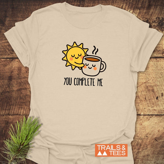 You Complete Me - Sun & Coffee T-Shirt featuring a smiling sun and coffee mug design, crafted from soft cotton for comfort and durability.