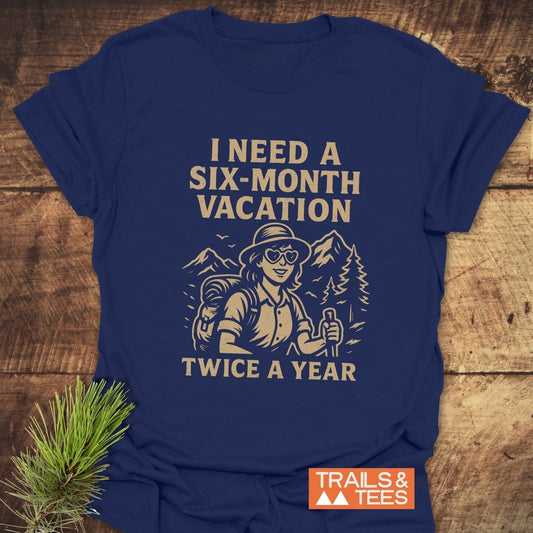 Six-Month Vacation T-Shirt featuring bold text and a hiker graphic, crafted from soft ring-spun cotton, ideal for outdoor enthusiasts.