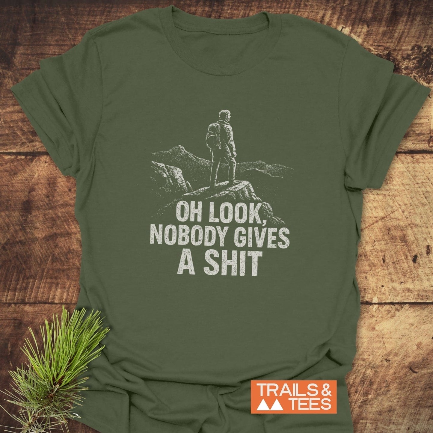 Oh Look! T-Shirt featuring a hiker graphic and bold text. Crafted from soft cotton for comfort and durability, ideal for outdoor enthusiasts.