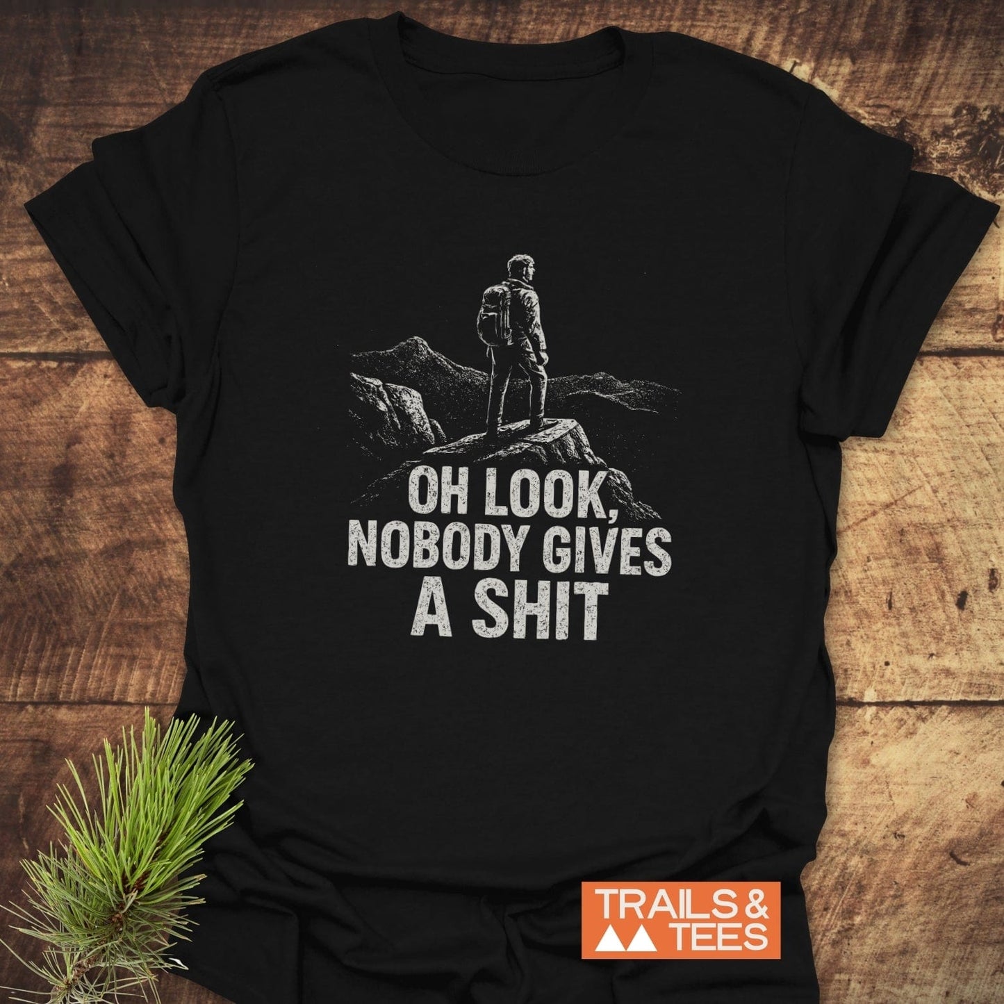 Oh Look! T-Shirt features a hiker graphic and bold slogan, crafted from soft cotton for comfort and durability, ideal for outdoor enthusiasts.