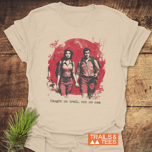 No Kiss Cam T-Shirt featuring a couple with backpacks, printed on soft, lightweight cotton, perfect for outdoor enthusiasts seeking comfort and style.