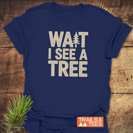 Wait I See A Tree T-Shirt with pine-tree graphic, crafted from soft ring-spun cotton, featuring durable prints and eco-friendly on-demand printing for outdoor enthusiasts.