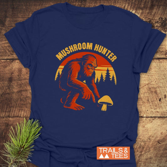 Mushroom Hunter T-Shirt featuring a retro sasquatch graphic, crafted for comfort with ring-spun cotton, pre-shrunk for fit, durable print, and sustainable production.