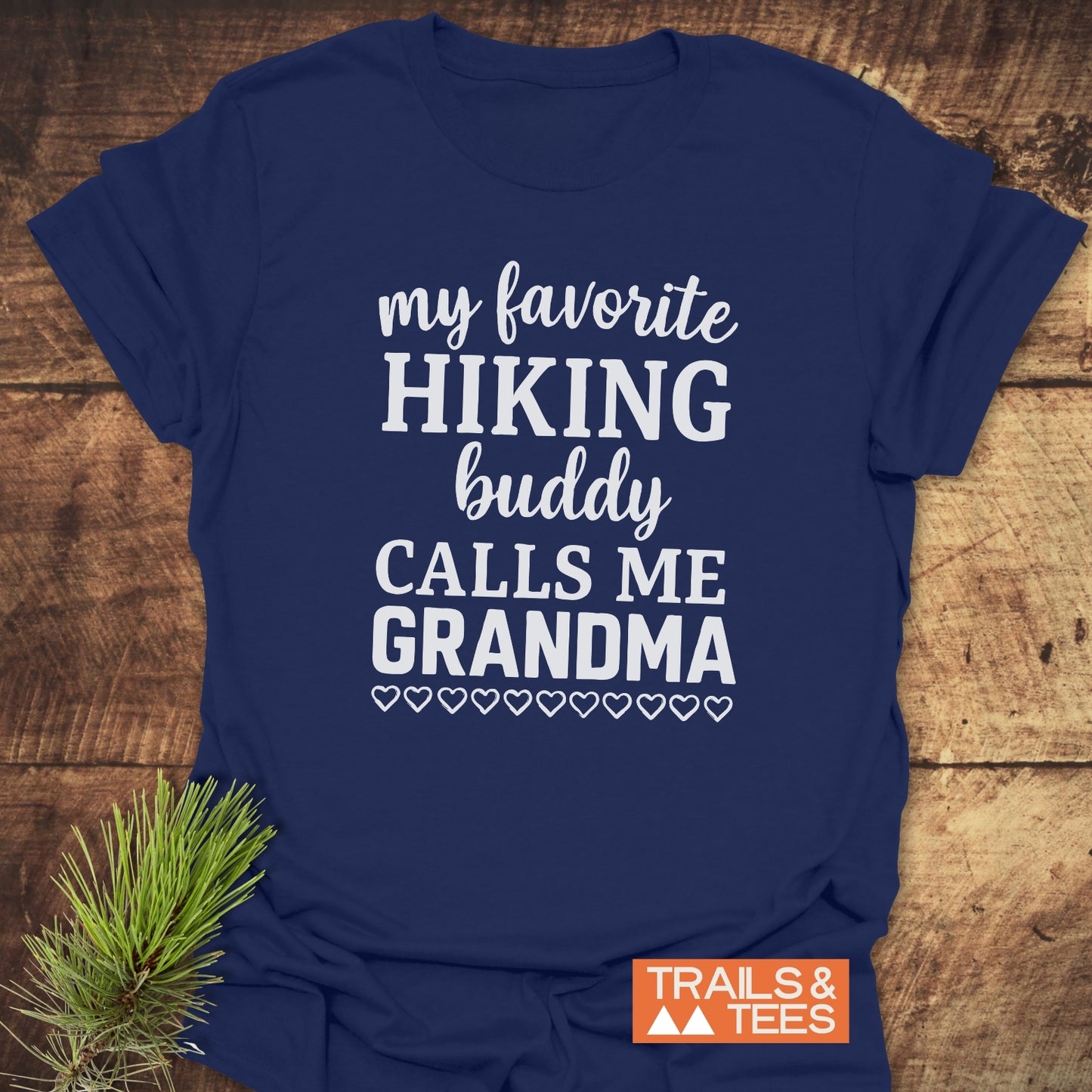 Navy-blue Hiking Grandma T-Shirt with phrase my favorite HIKING buddy CALLS ME GRANDMA in white, featuring durable print and soft cotton for outdoor comfort.