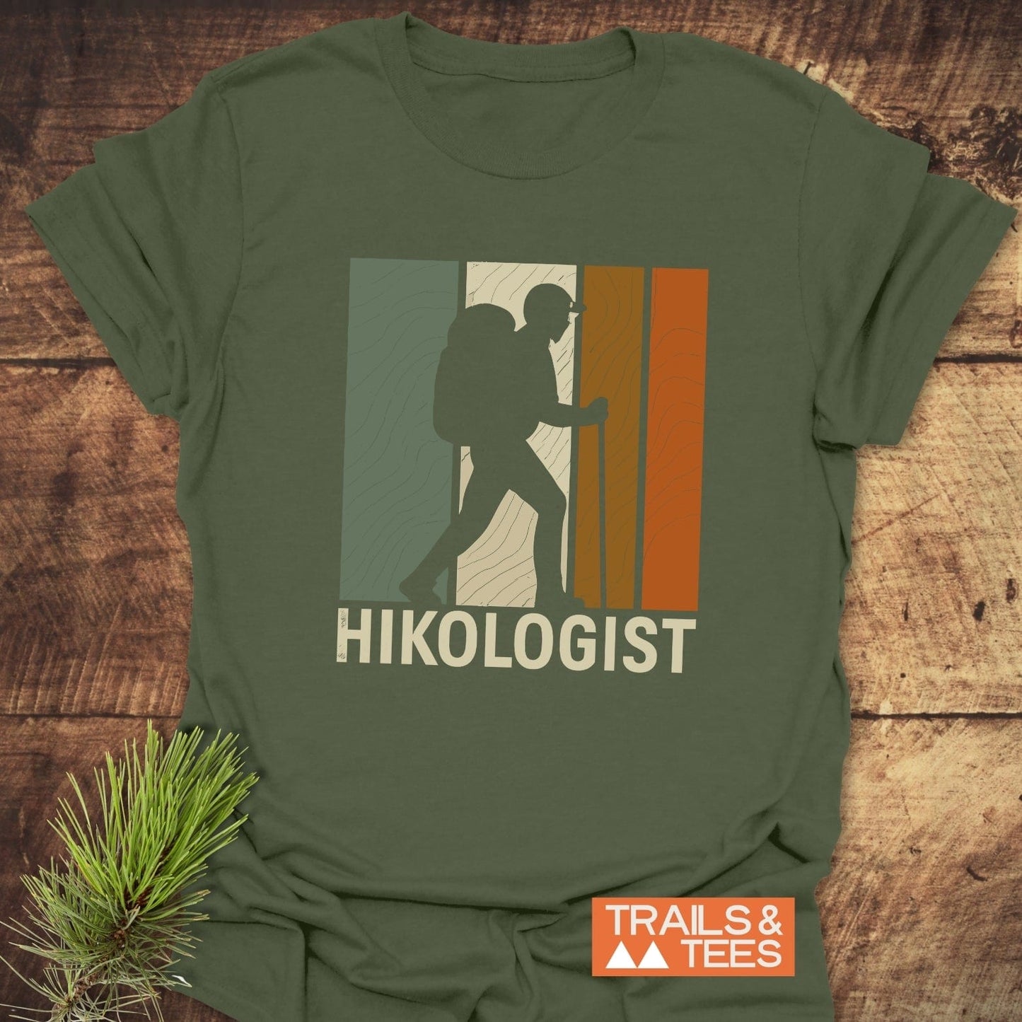 Hikologist T-Shirt features a retro backpacker graphic on olive-green, showcasing adventure spirit. Made from soft cotton, it's durable with pre-shrunk fit and eco-friendly print.
