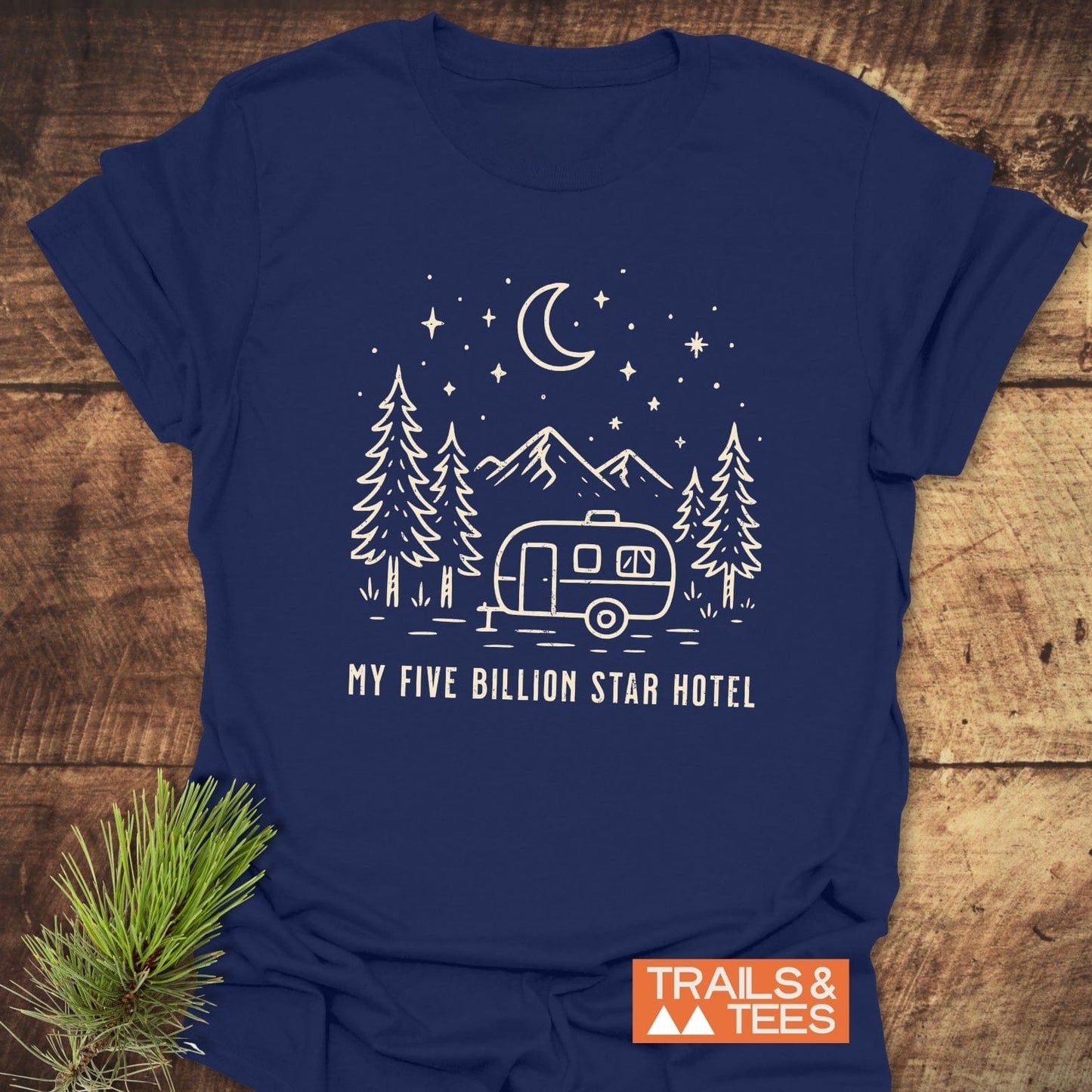 My 5 Billion Star Hotel T-Shirt with camper and nature scene, crafted from soft cotton, features durable prints and a TRAILS & TEES logo.