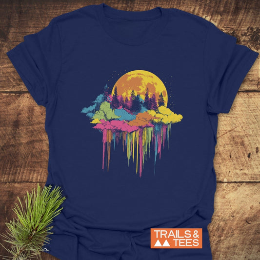 Moonlight Meltdown T-Shirt featuring a dreamy illustration of a yellow moon, conifer silhouettes, and vibrant clouds, showcasing trail-ready comfort and durable print.