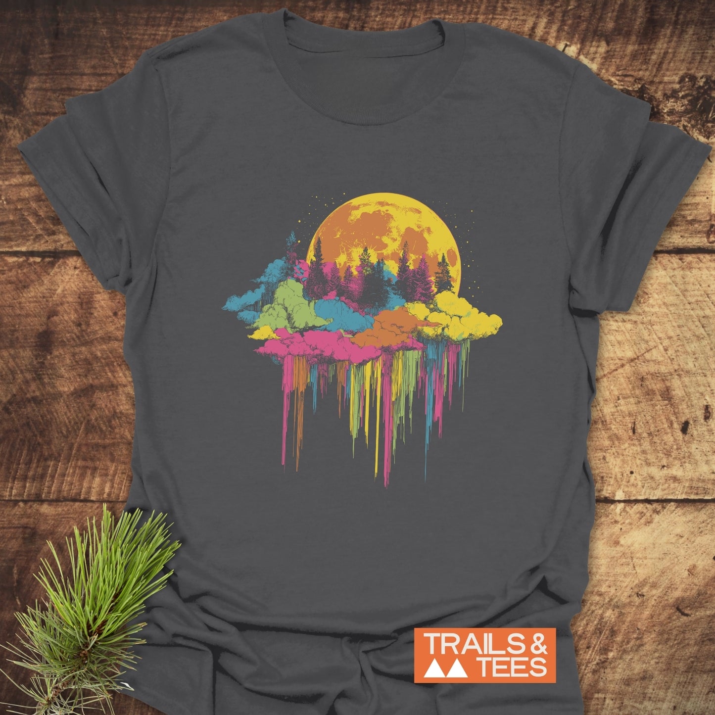 Moonlight Meltdown T-Shirt featuring a psychedelic moon and pine tree graphic on soft, ring-spun cotton, ideal for outdoor enthusiasts, showcasing durable, fade-resistant prints.