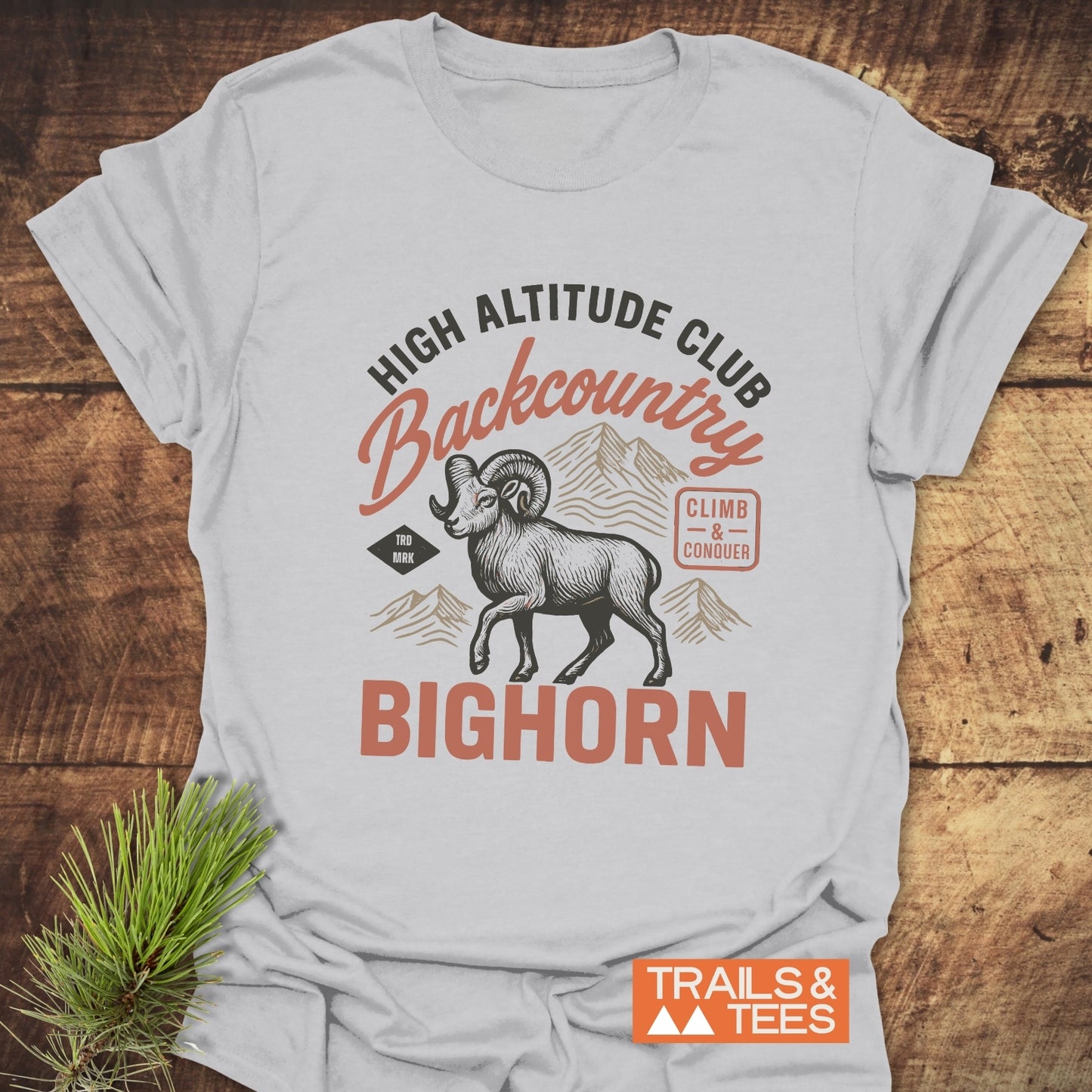 High Altitude Club T-Shirt featuring a bighorn sheep graphic and motivational text, crafted from soft cotton for comfort and durability, ideal for outdoor enthusiasts.