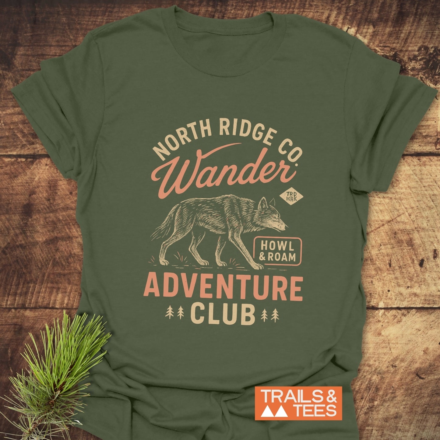 Howl And Roam Wolf T-Shirt featuring a vintage-style wolf print on forest-green fabric, laid flat; ideal for outdoor enthusiasts with durable, comfortable design.