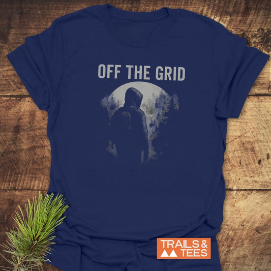 Off The Grid T-Shirt featuring a graphic of a figure walking into trees under a full moon, highlighting outdoor adventure spirit.