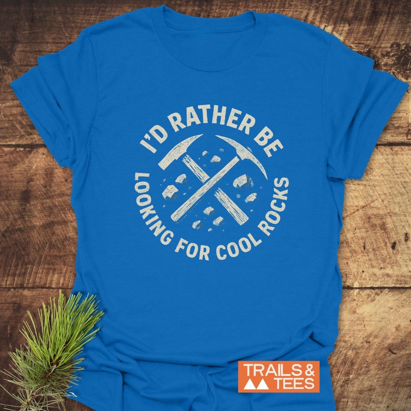 I'd Rather... Rocklover T-Shirt featuring a rock-hammer graphic, crafted from soft cotton with durable prints, ideal for outdoor enthusiasts.