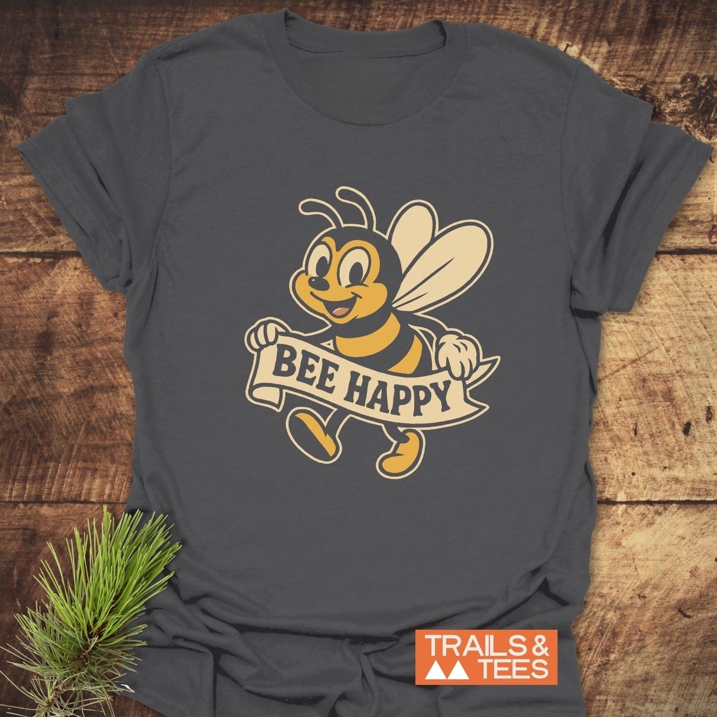 Bee Happy Cheerful T-Shirt featuring a vintage-style cartoon bee with BEE HAPPY banner, on soft ring-spun cotton, designed for comfort and adventure.