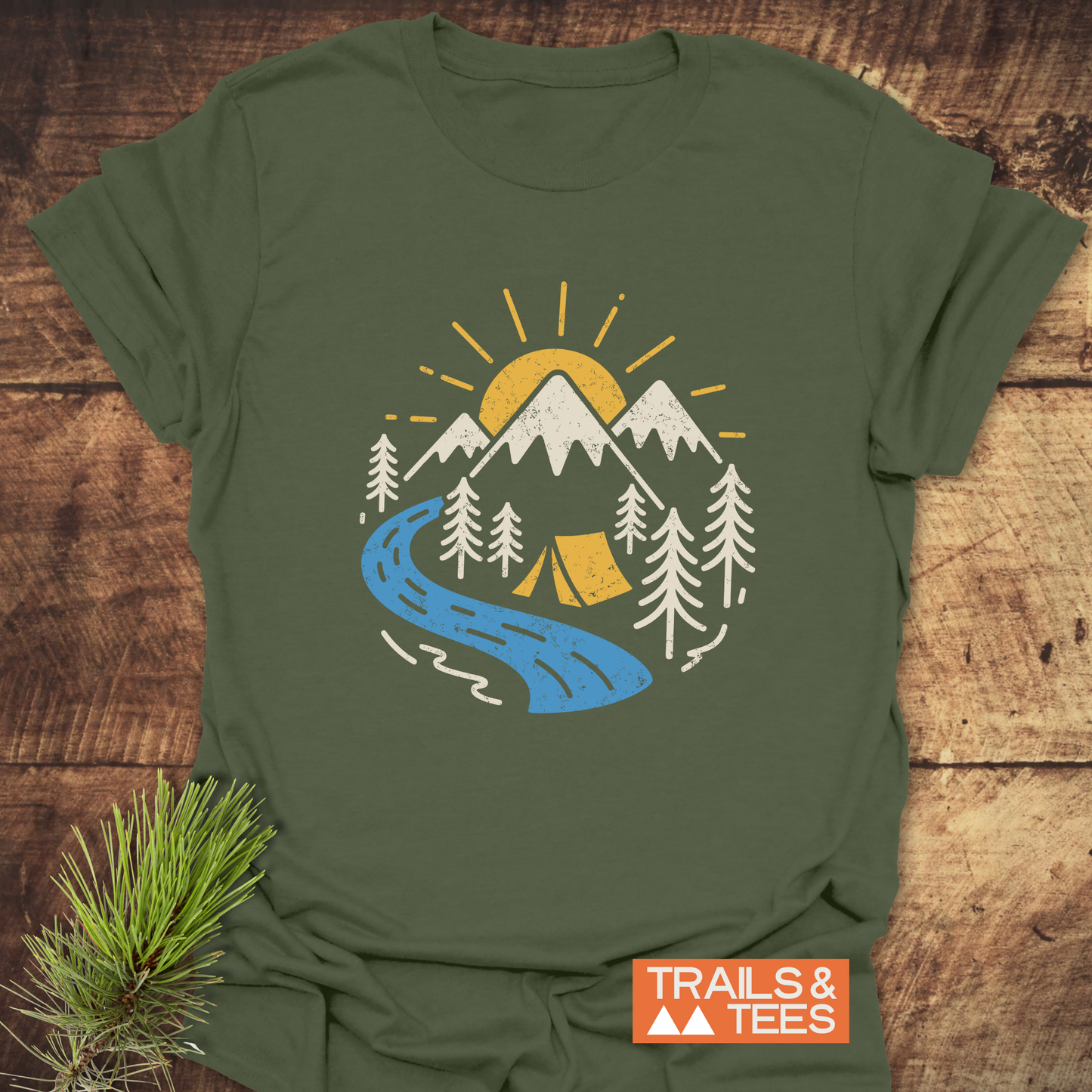 Camping Love T-Shirt with retro camping graphic, showcasing sun, mountains, trees, and tent. Crafted from soft cotton, designed for outdoor enthusiasts by TRAILS & TEES.