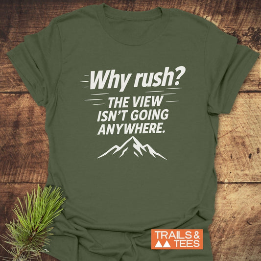 Olive-green tee with Why rush? The view isn’t going anywhere text and mountain silhouette; features durable print, taped shoulders for lasting shape.