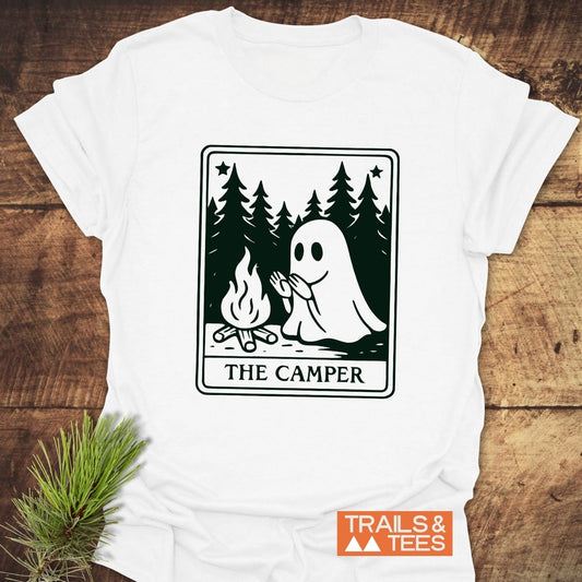 The Camper Retro Tarot T-Shirt, featuring a ghost by a campfire graphic, offers soft, lightweight comfort, ideal for outdoor adventures with durable, fade-resistant print.