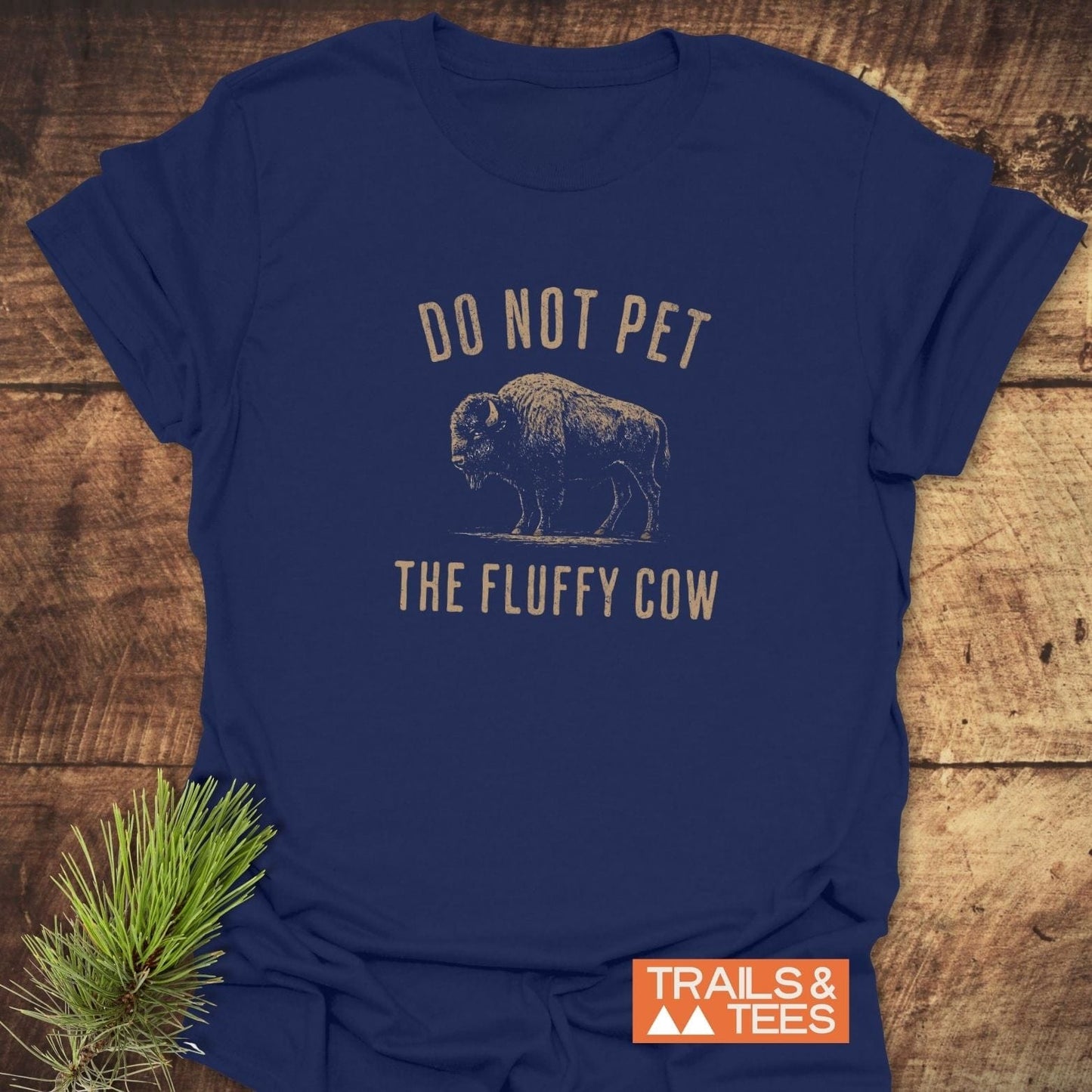 Do Not Pet Bison T-Shirt featuring a vintage bison illustration, styled with a pine branch. Made from soft, lightweight cotton with durable prints, perfect for outdoor enthusiasts.