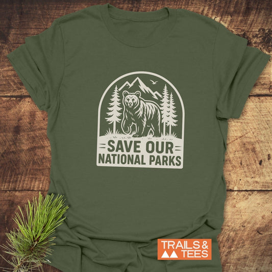 Save National Parks T-Shirt featuring a bear and pine trees graphic, crafted from soft, durable cotton, designed for outdoor enthusiasts.