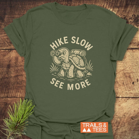 Hike Slow Funny T-Shirt with turtle print, soft ring-spun cotton, perfect for outdoor enthusiasts. Features durable print and reliable fit, designed for comfort.