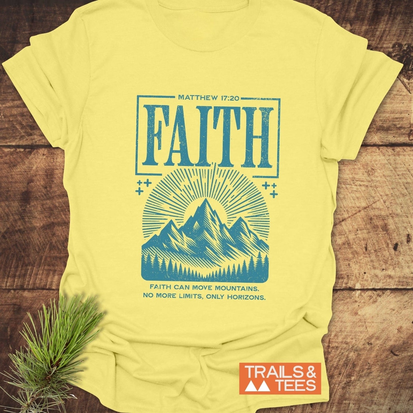 Faith Moves Mountains T-Shirt featuring a teal graphic with Matthew 17:20, durable DTF print, on lightweight ring-spun cotton for outdoor enthusiasts.