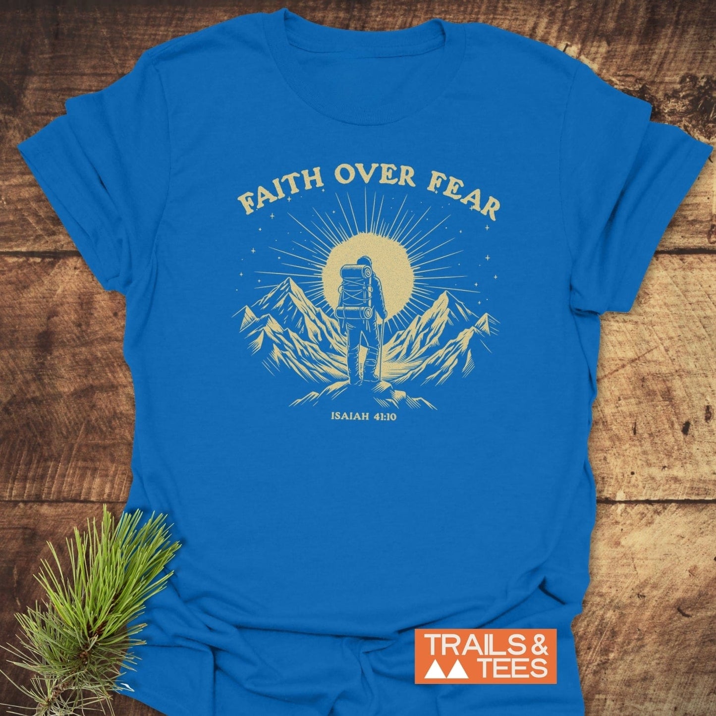 Faith Over Fear T-Shirt featuring a backpacker on a peak, with durable mountain-themed print, crafted from soft cotton for everyday outdoor adventures.