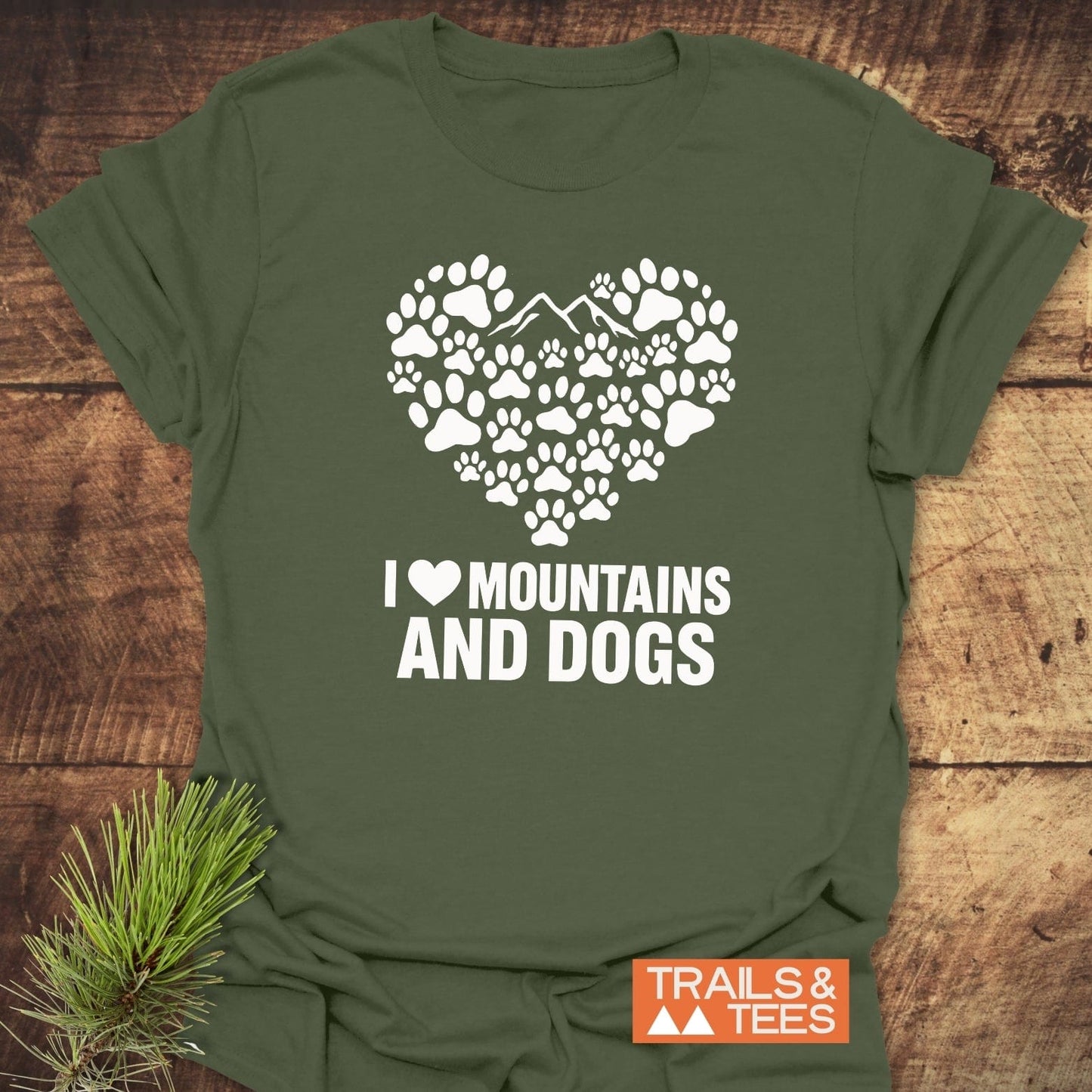 Paw Heart Dog Lover T-Shirt with paw-print heart and mountain design, showcasing “I ❤ MOUNTAINS AND DOGS,” on soft, durable, lightweight ring-spun cotton.