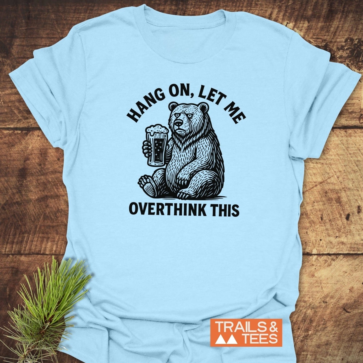 Hang On Funny T-Shirt with bear and beer print, crafted from soft ring-spun cotton, showcasing durable DTF prints, taped shoulders, and a small Trails & Tees logo.