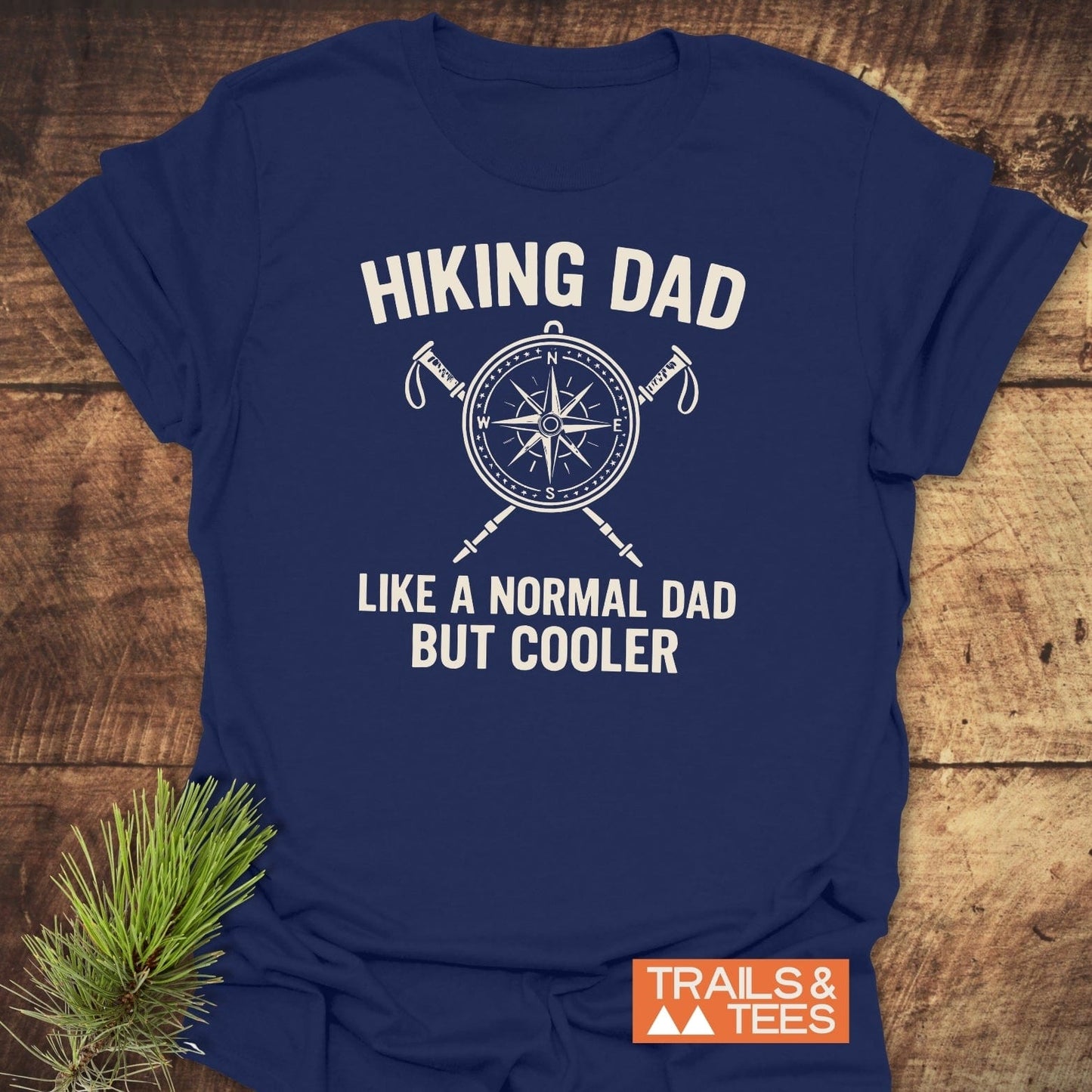 Cool Hiking Dad T-Shirt with compass rose and hiking poles, crafted from soft cotton for comfort and durability, featuring bold text for outdoor enthusiasts.