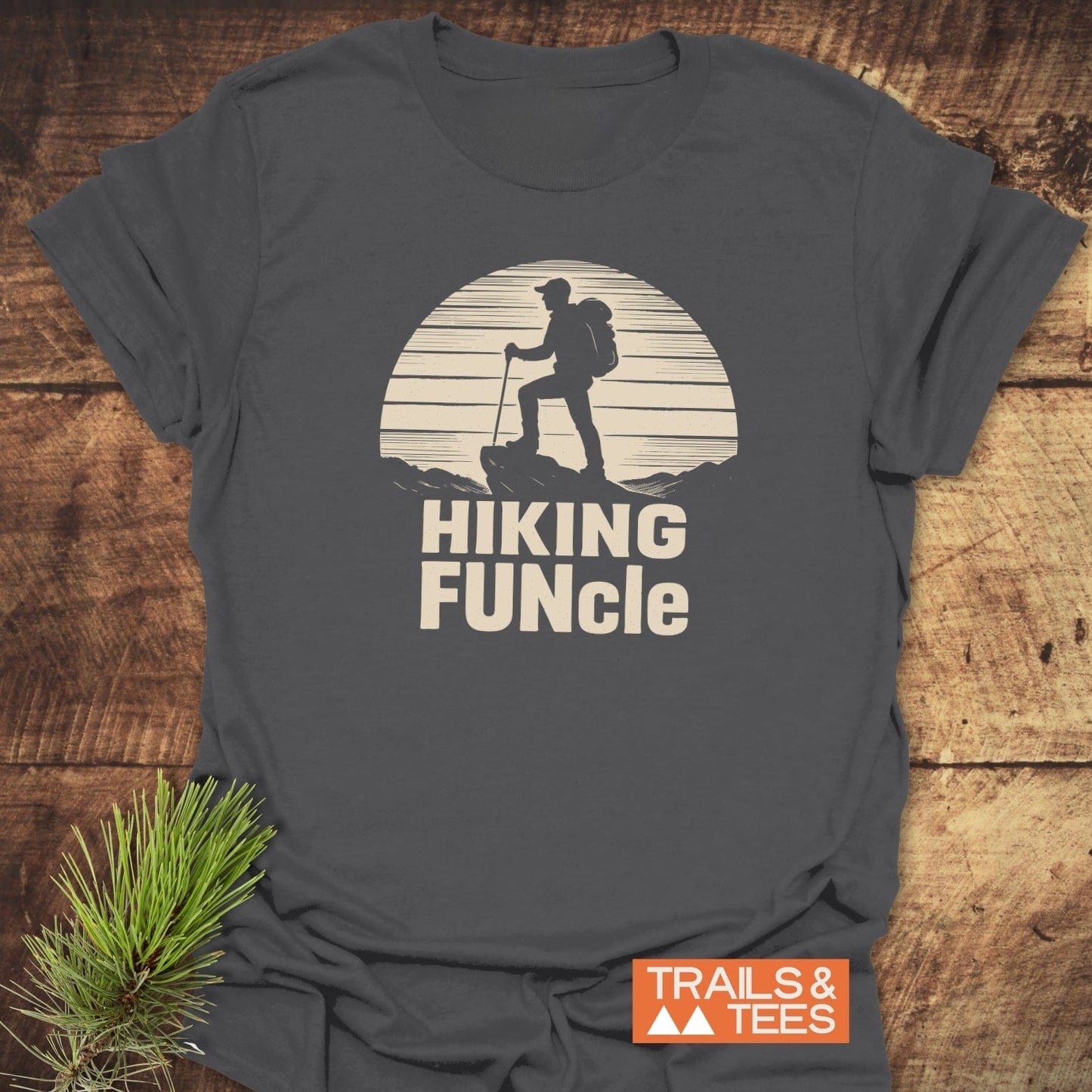 Hiking FUNcle T-Shirt featuring a hiker graphic with the slogan “HIKING FUNcle,” showcasing comfort and style for outdoor enthusiasts.