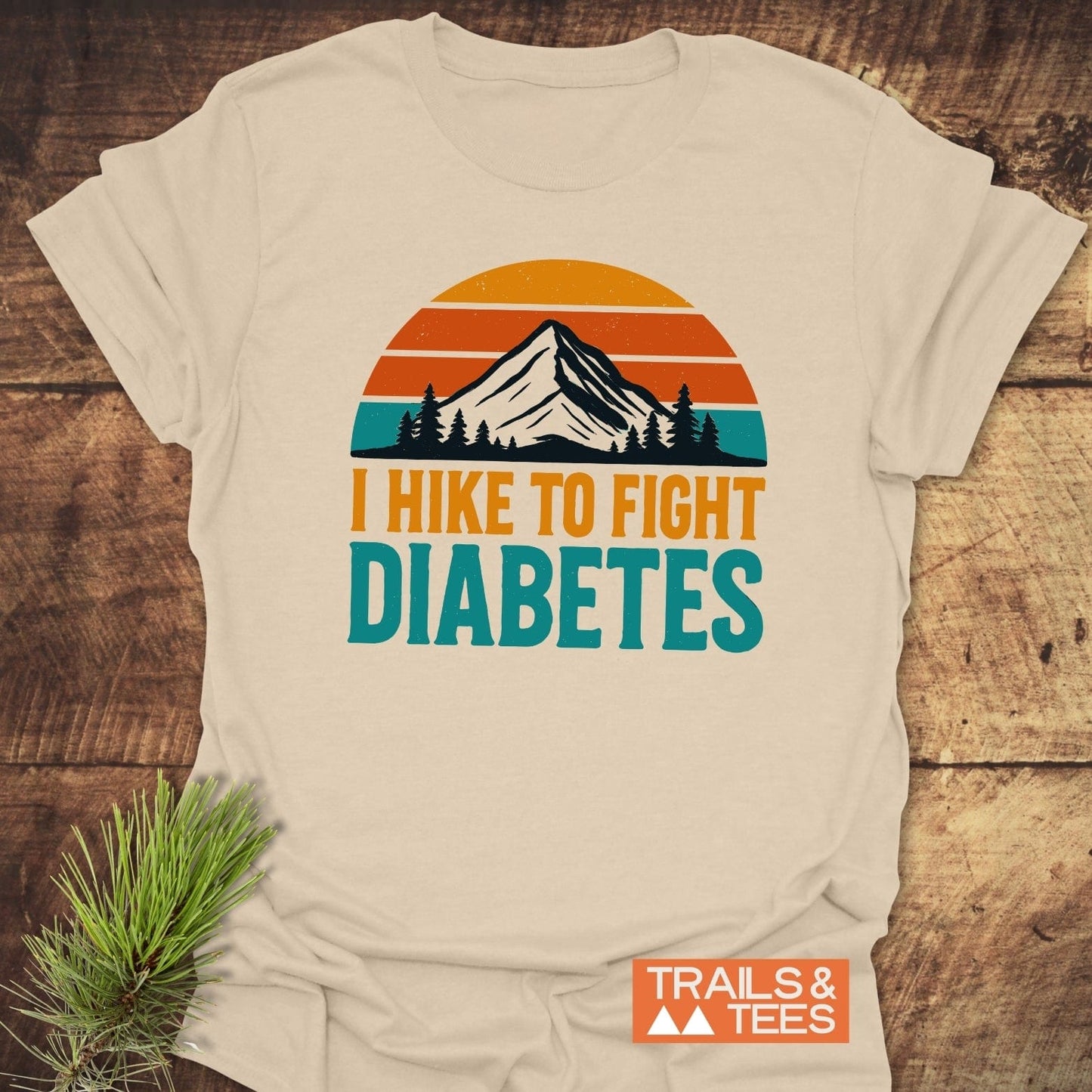 Hike To Fight Diabetes T-Shirt featuring a mountain graphic with a sunset backdrop, crafted from soft cotton for outdoor comfort and enduring style.