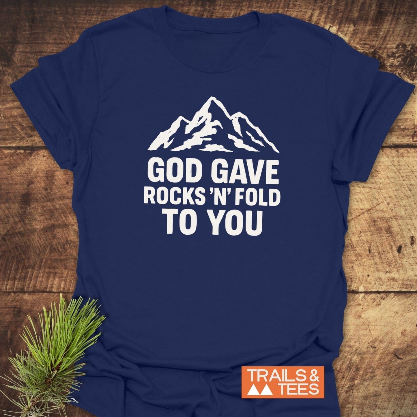 Navy-blue God Gave... Funny Geology T-Shirt with white mountain graphic and slogan, TRAILS & TEES logo, showcasing durable, adventure-ready design.