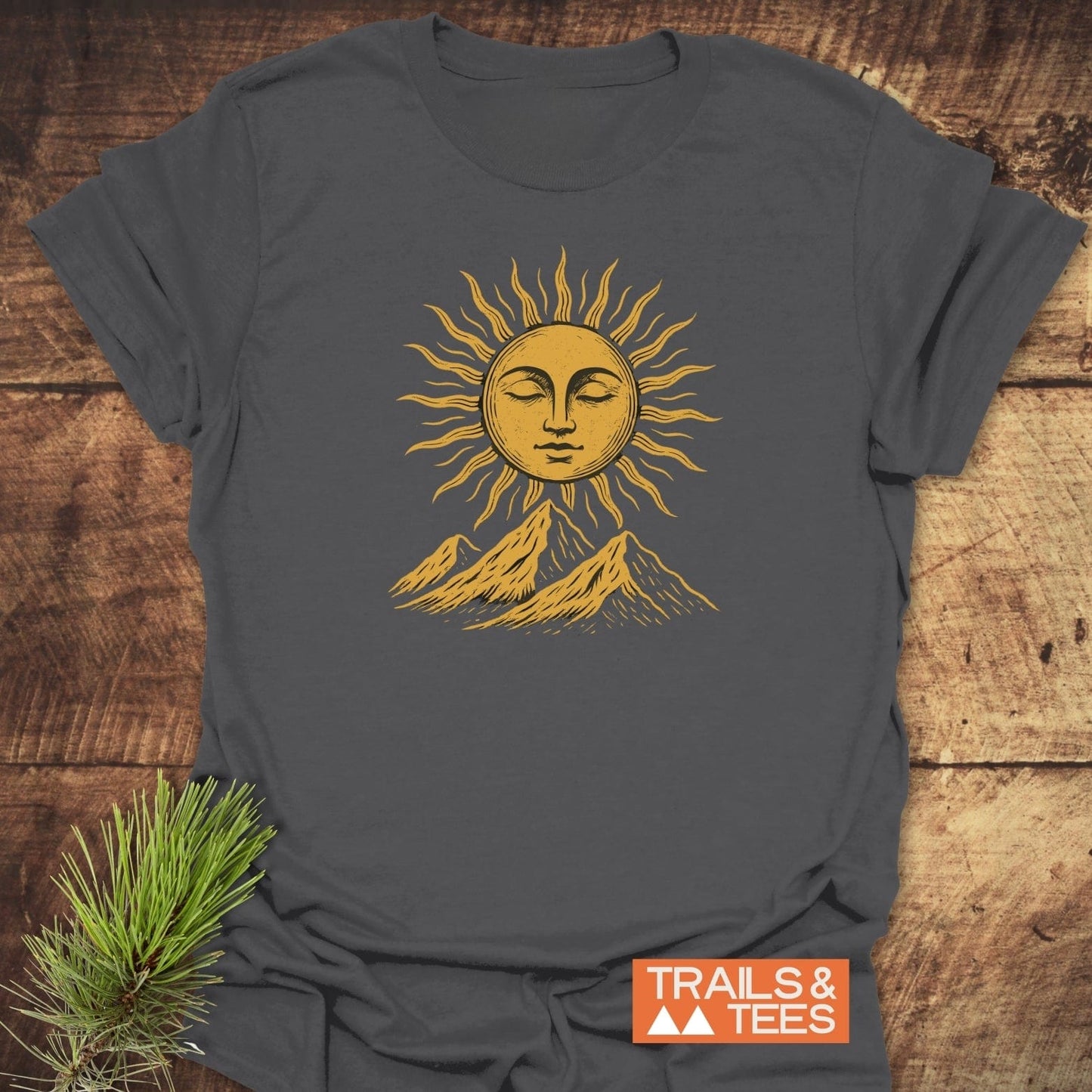 Sun And Mountains Boho T-Shirt featuring a golden sun and mountain design, crafted from soft, lightweight cotton for comfort and adventure-ready wear.