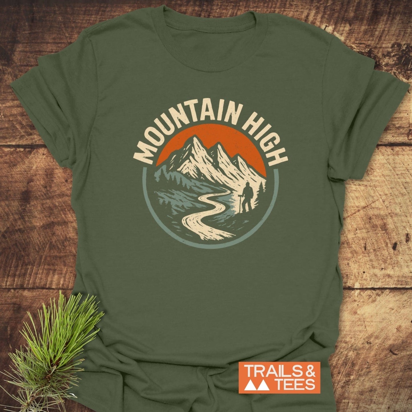 Mountain High T-Shirt with retro mountain trail graphic, soft ring-spun cotton, durable print, pre-shrunk fit, ideal for outdoor enthusiasts.