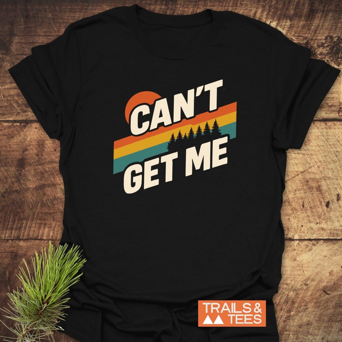 Can't Get Me Hiking T-Shirt with retro sun and pine design on soft cotton, ideal for outdoor enthusiasts. Features durable print, pre-shrunk, and seamless fit.