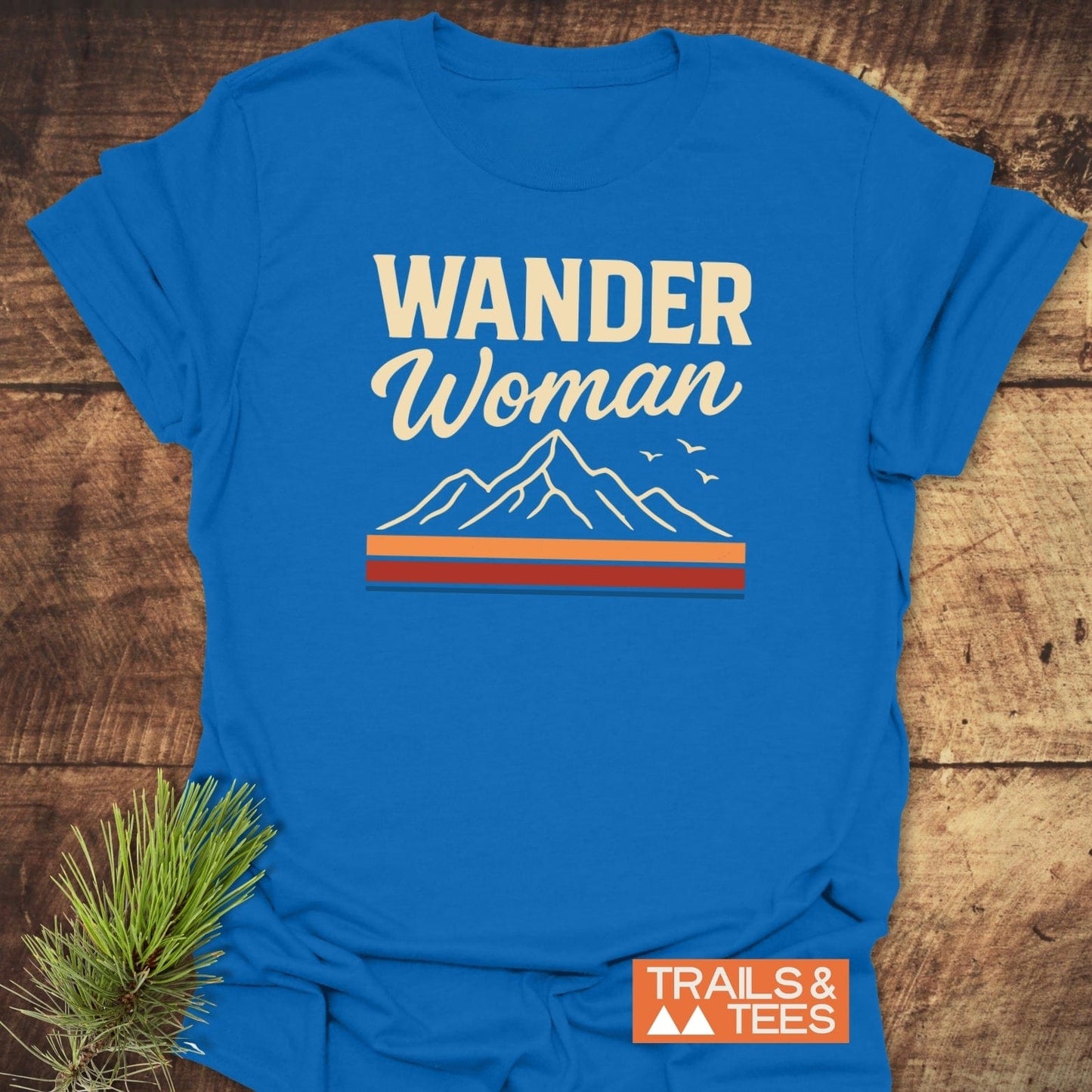 Wander Woman Graphic T-Shirt with mountain design and birds, crafted from soft ring-spun cotton, offering trail-tested comfort and durability for outdoor enthusiasts.