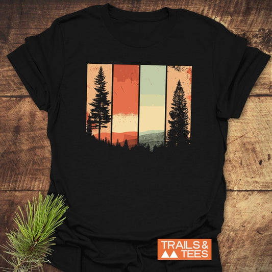 Striped Mountains Retro T-Shirt: Black tee with vintage forest graphic, highlighting pine trees and mountains. Relaxed fit, durable print, perfect for outdoor enthusiasts.