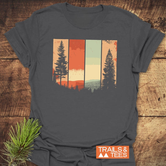 Striped Mountains Retro T-Shirt featuring a stylized forest scene with pine tree silhouettes, crafted from lightweight cotton for comfort and durability, ideal for outdoor enthusiasts.