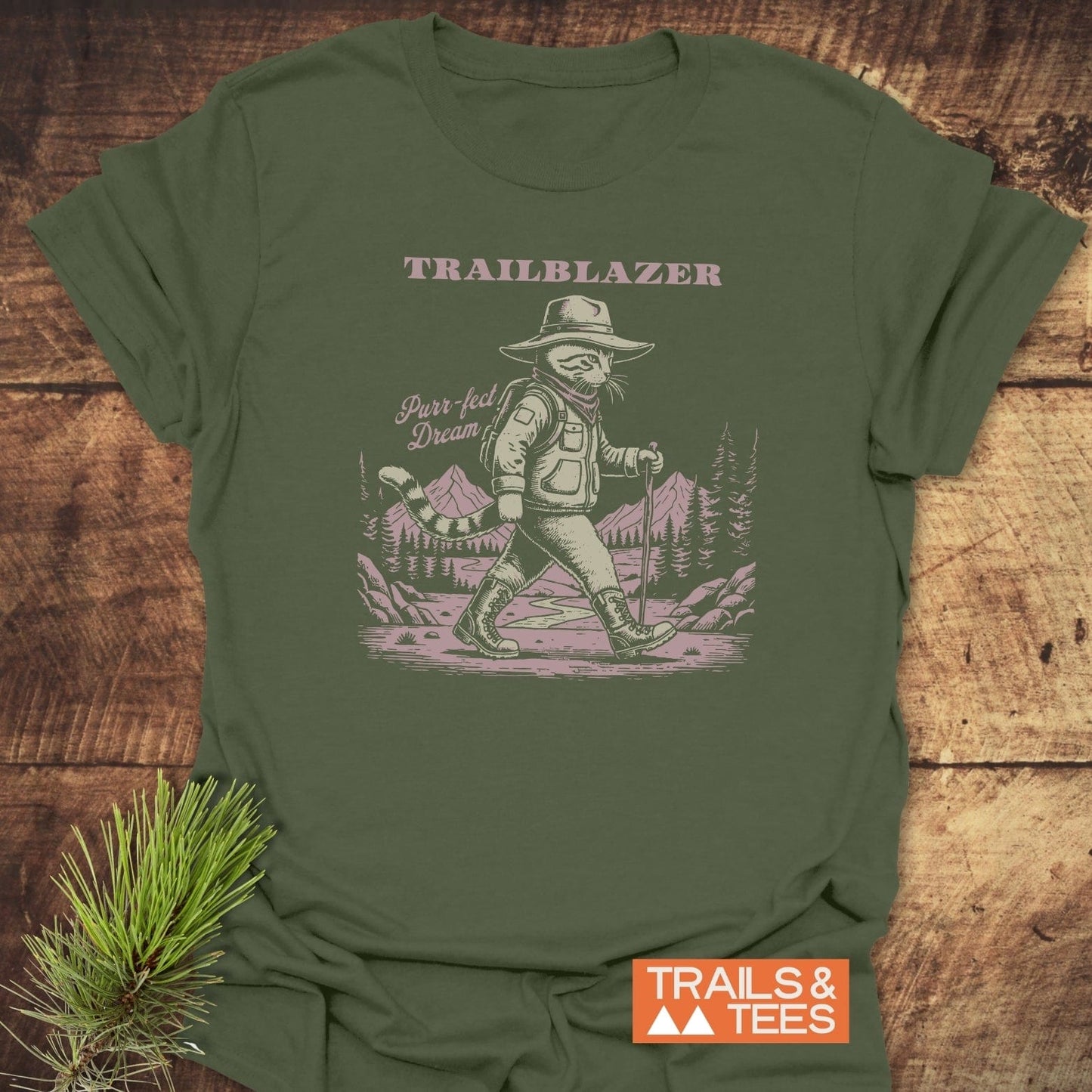 Forest-green Purr-fect Dream Hiking T-Shirt featuring a vintage-style hiking cat illustration, emphasizing trail-ready comfort and durable print, ideal for outdoor enthusiasts.