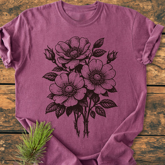 The Wild Rose Bouquet - Vintage Heavyweight Tee features a botanical line drawing of three flowers on a heathered T-shirt, showcasing a relaxed fit and durable double-needle stitching.