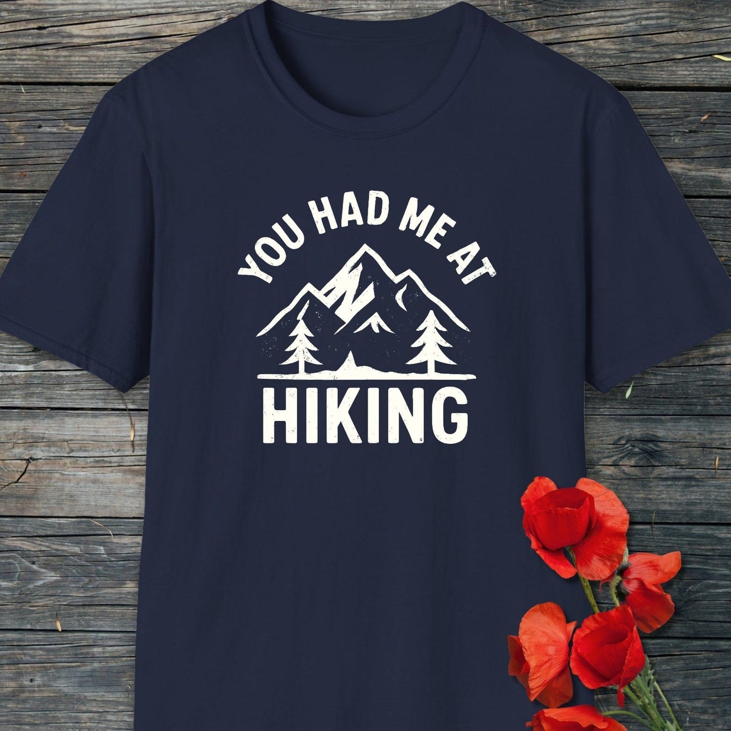 You Had Me At Hiking T-Shirt with mountain and pine design on dark navy, showcasing adventure spirit. Made from soft cotton, ideal for outdoor enthusiasts.