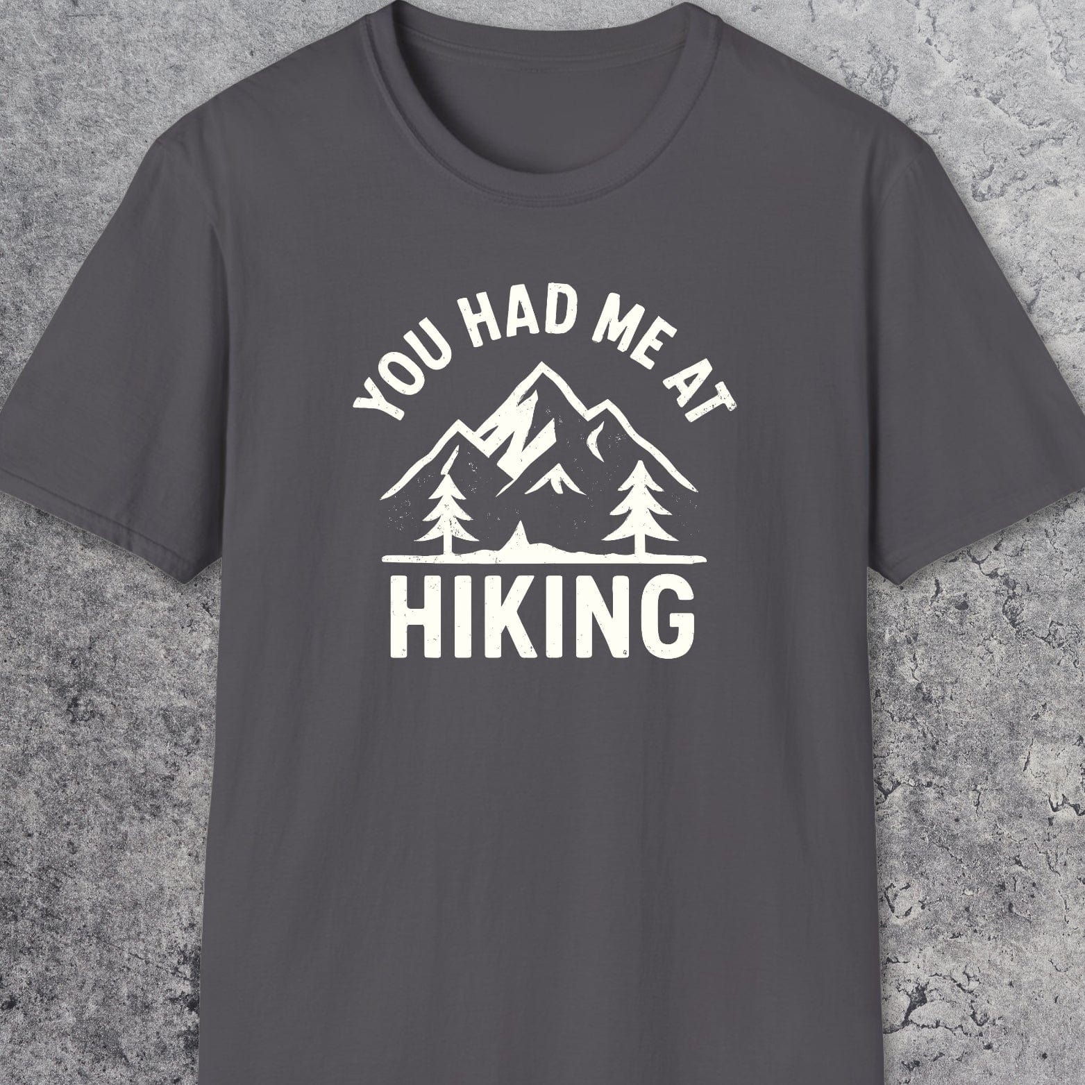 You Had Me At Hiking T-Shirt featuring a mountain and pine tree graphic, perfect for outdoor enthusiasts, crafted from soft, lightweight cotton for comfort and durability.