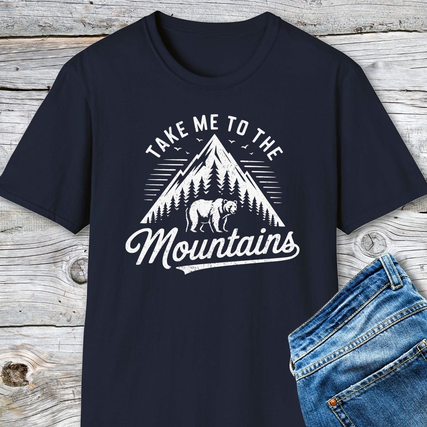 Take Me To The Mountains T-Shirt with mountain and bear print, perfect for adventures. Made of soft, lightweight cotton for comfort and movement.